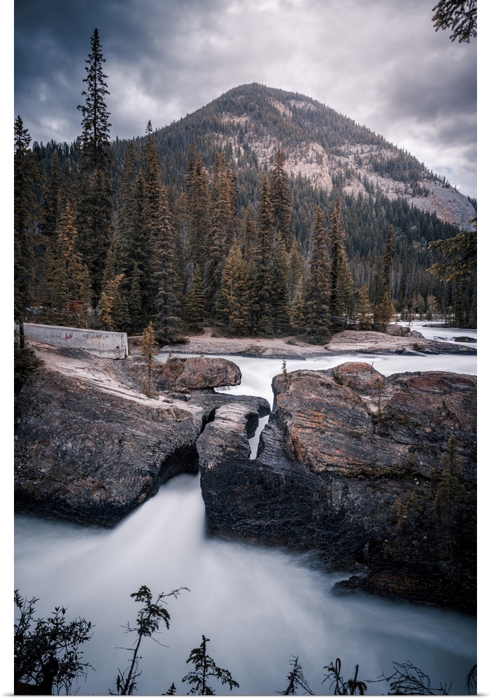 Silky water from long exposure at Natural Bridge of Yoho National Park on the western slopes of the Canadian Rocky Mountains.