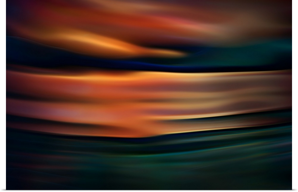 Abstract photograph of blurred and blended colors and flowing lines, with orange waves.