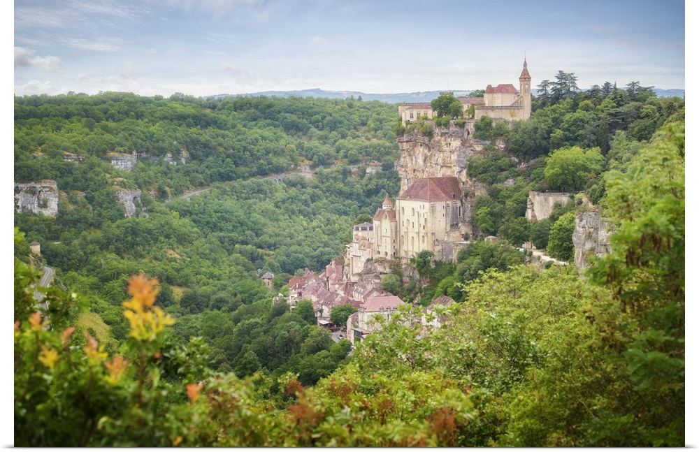 Landscape view of Rocamadour, old medival city in The south of France on occitanie area.
City in the middle of a green fo...