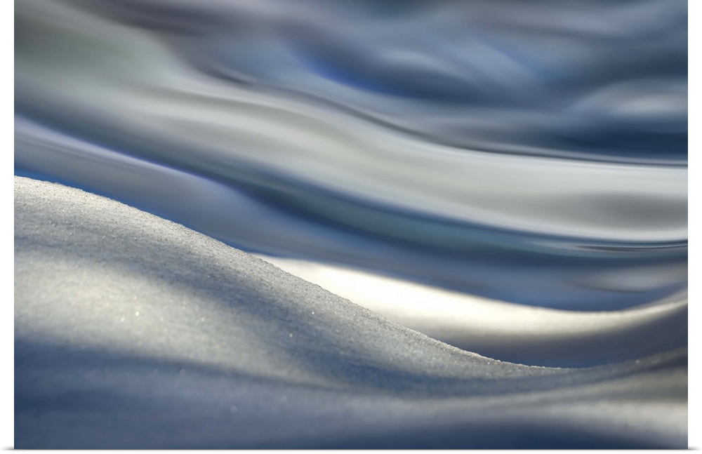 Sloping snow blurring into abstract shapes.