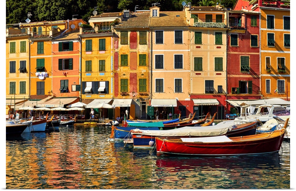 Small boats and colorful old houses in Portofino Harbor, Liguria, Italy.