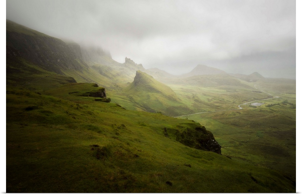 The green Quiraing moutains on a rainy day in skye island in northern Scotland, UK