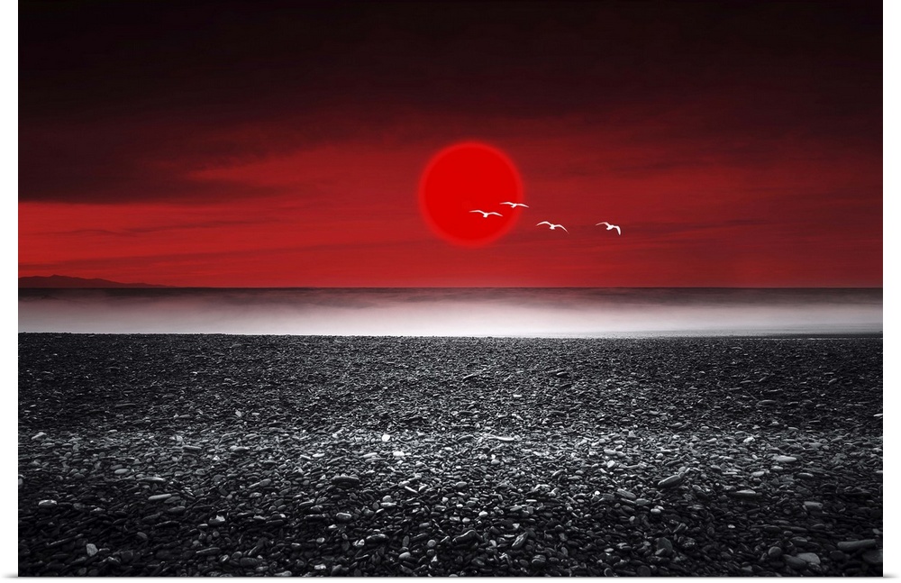 Red sunset over a black sand beach