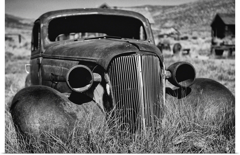Antique car body of a 1937 Chevrolet is rusting away, Bodie California.
