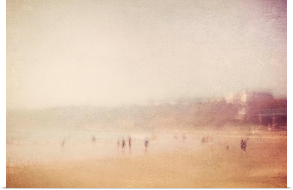 A vintage textured dreamy blurred image of Scarborough seaside beach, England, on a hot summers day with children playing ...