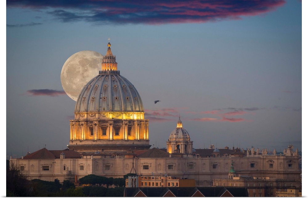 Fine art photograph of the moon rising right behind St. Peter's Basilica in Rome.