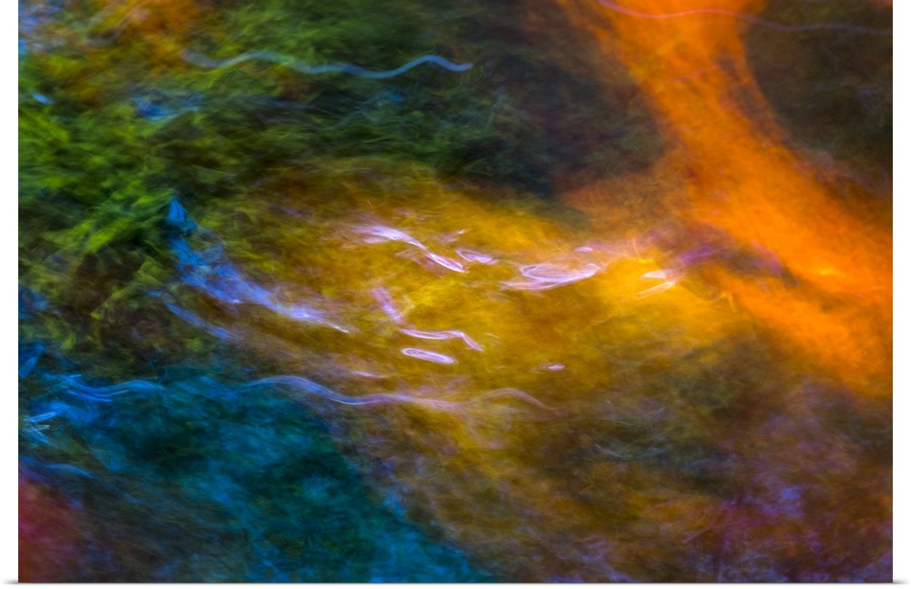 Photograph of colorful rippling water.