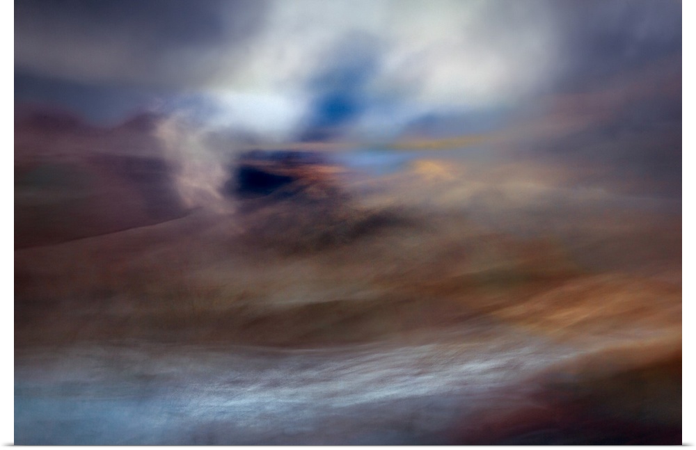 An impressionistic dreamy blurred Turneresque seascape of swirling water and sky in blues, oranges and silvery tones full ...