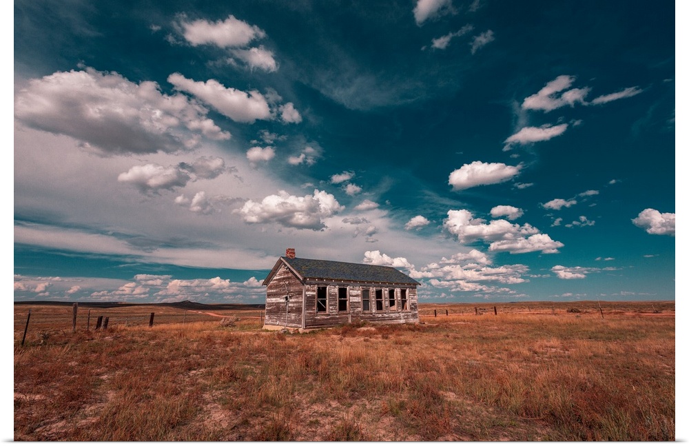 Beautiful clouds over lone house at Thunder Basin National Grassland, Wyoming