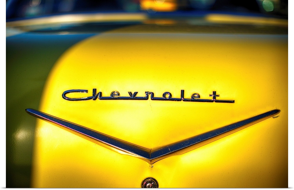 A photo of vintage Chevrolet metal emblem.