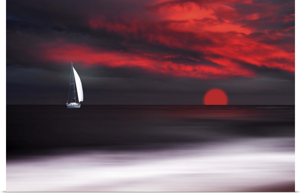 Sunset and white sailboat