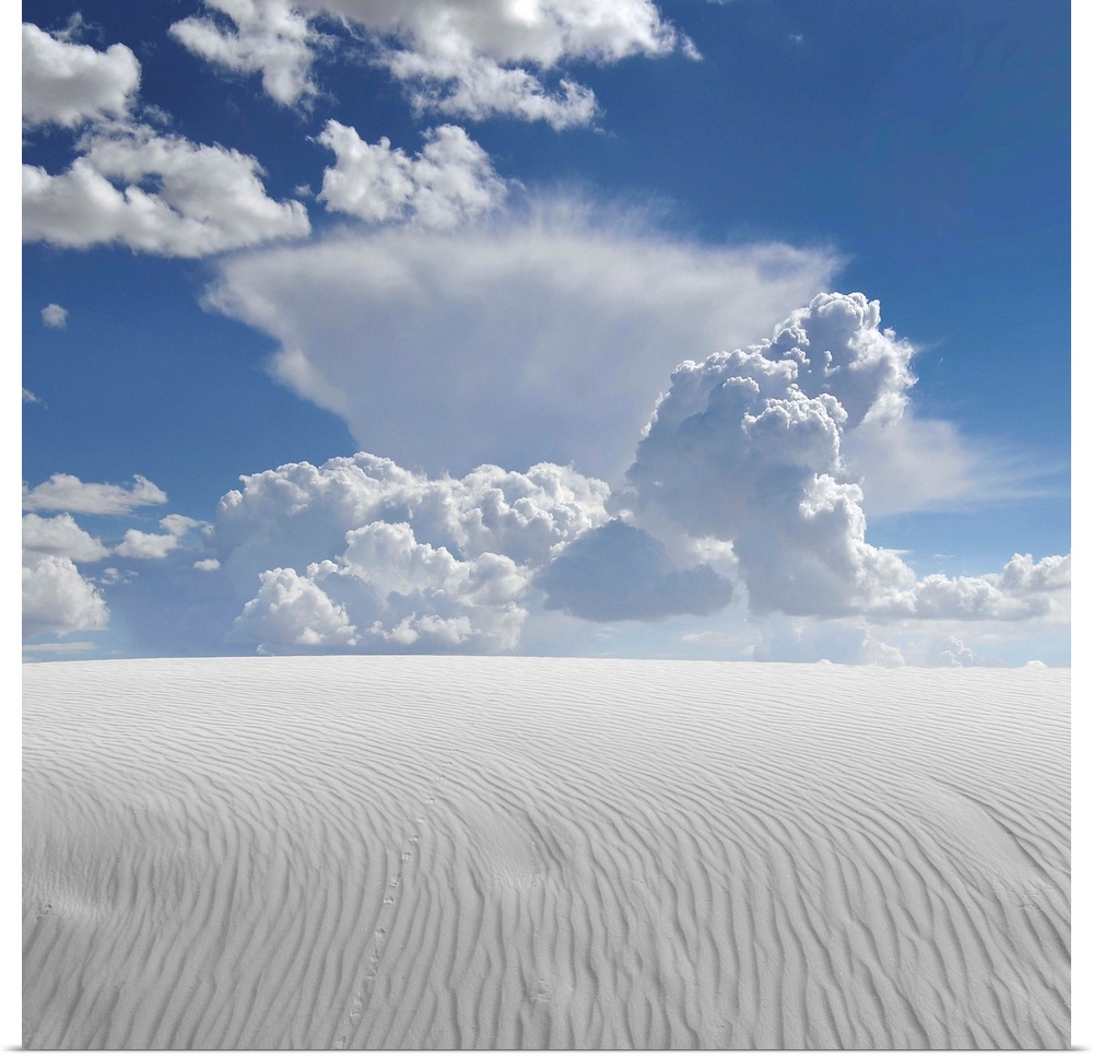 White sand desert with clouds
