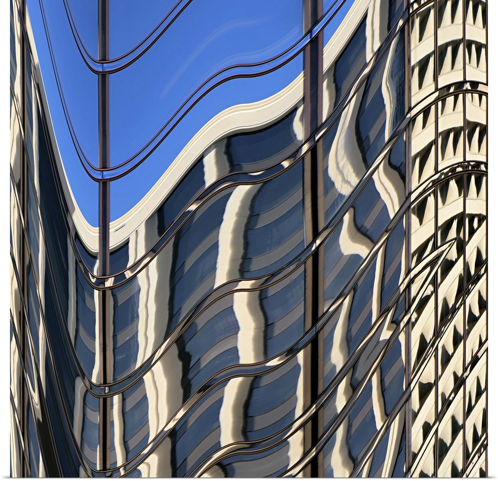 Conceptual photograph of the windows on the side of a building, warped to create an abstract image.