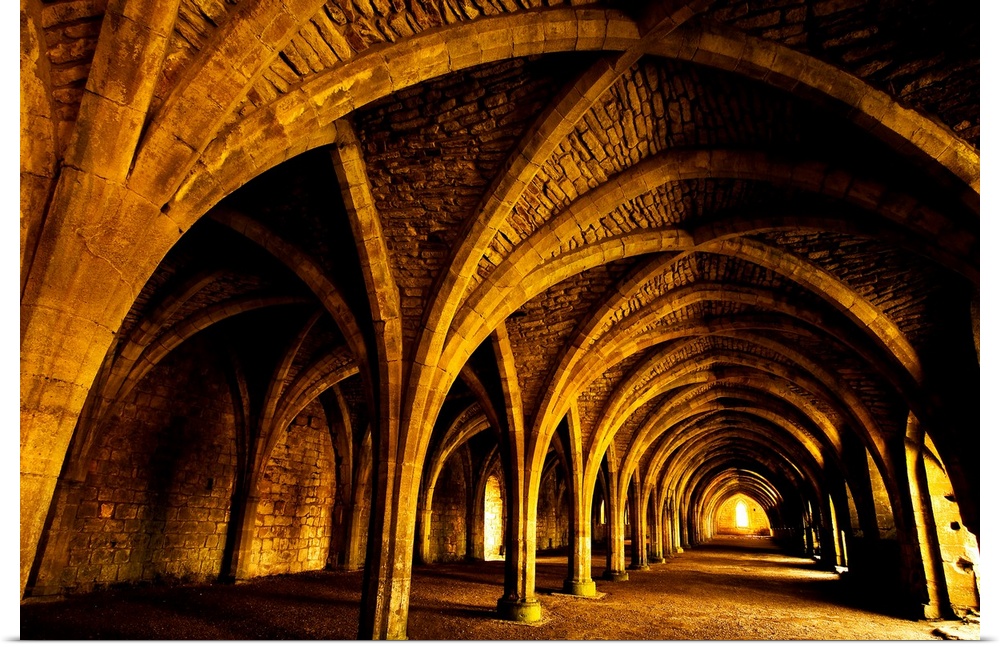 A receeding passage through gothic arches.
