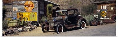 Abandoned vintage car at the roadside Route 66 Arizona
