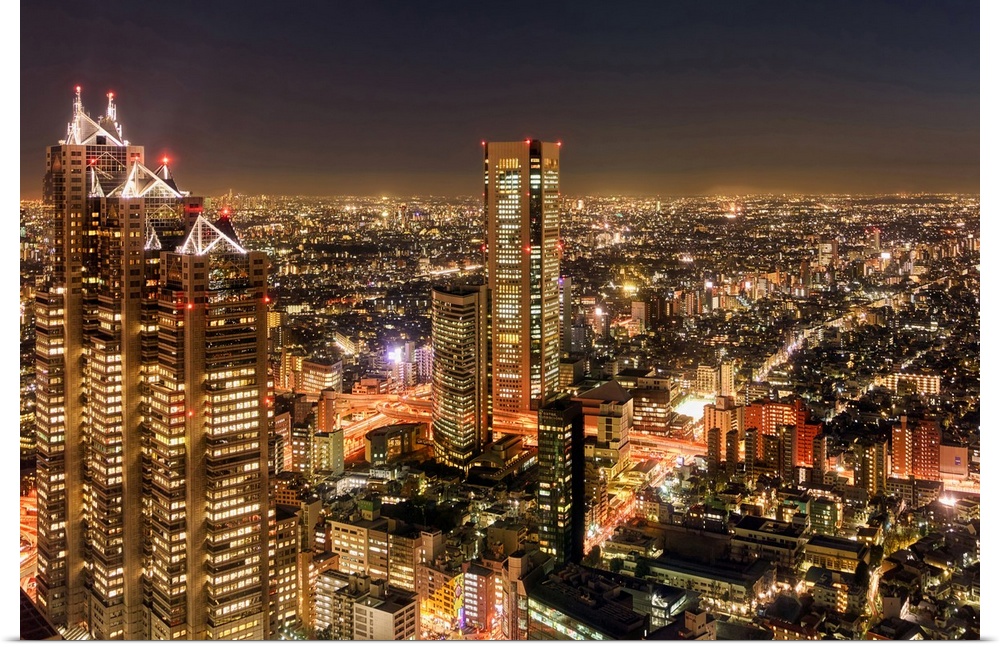 Aerial view of a city at night, Shinjuku Park Tower, Shinjuku, Tokyo, Japan.