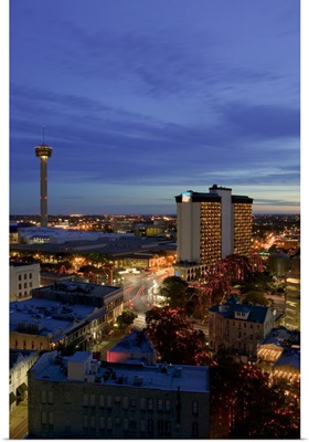 Aerial view of buildings lit up at dusk, San Antonio River Walk, San Antonio, Texas