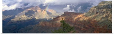 Arizona, Grand Canyon National Park, Rainbow and cloud over the mountain