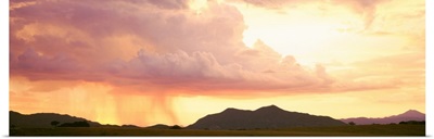 Arizona, Huachuca Mountains, San Rafael Valley, rain storm at sunset