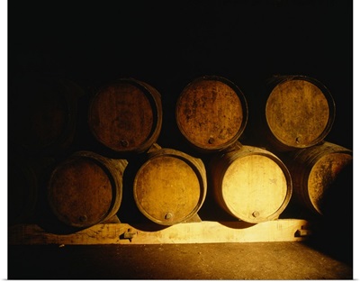 Barrels in a cellar, Chateau Pavie, St. Emilion, Bordeaux, France