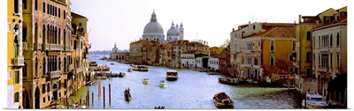 Boats in a canal with a church in the background, Santa Maria della Salute, Grand Canal, Venice, Veneto, Italy