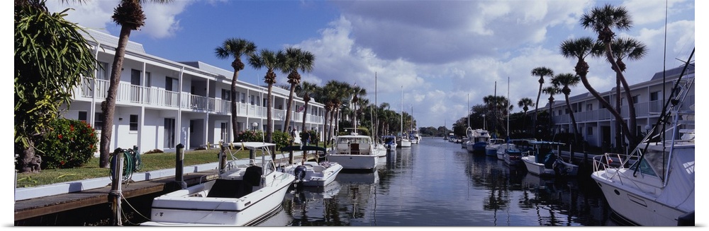 Boats moored at a canal, Venice, Gulf Coast, Florida