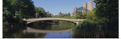 Bridge across a lake, Central Park, New York City, New York State