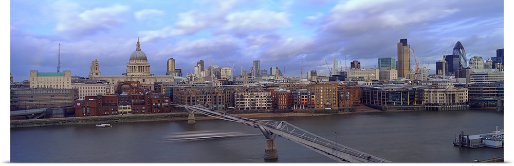 Bridge across a river, London Millennium Footbridge, Tate Modern, St. Paul's Cathedral, London, England