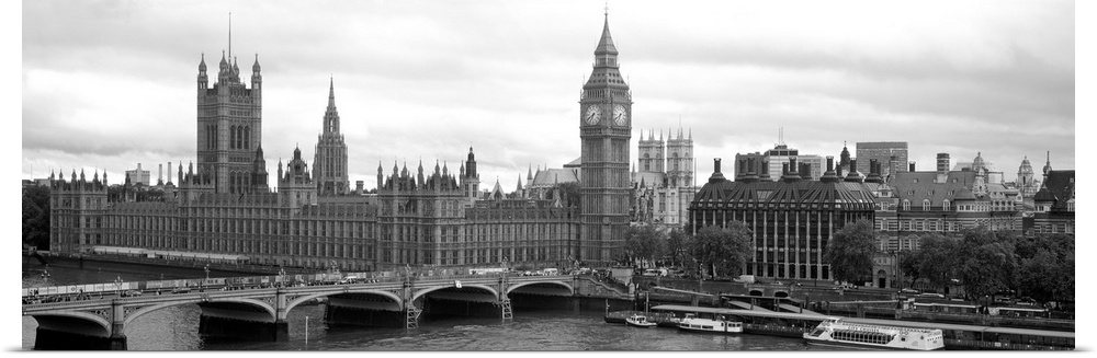 Panoramic photograph taken in Westminster focuses on Big Ben, the Houses of Parliament and the Westminster Bridge covering...