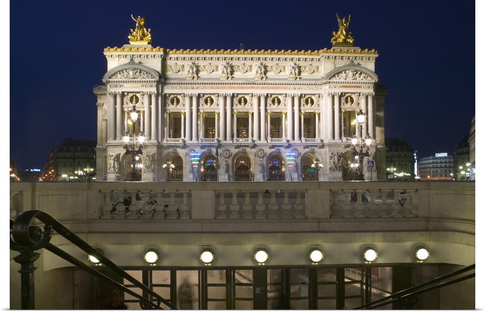 Building lit up at dusk, Opera Garnier, Paris, France