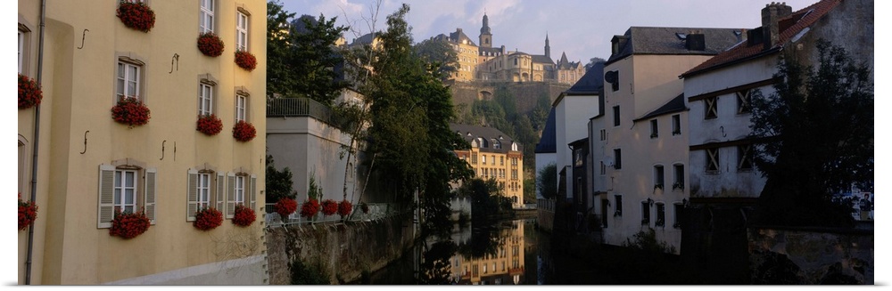 Buildings along a river, Alzette River, Grund District, Luxembourg City, Luxembourg