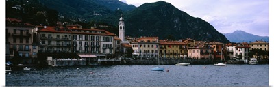 Buildings at the lakeside viewed from a ferry, Lake Como, Menaggio, Como, Lombardy, Italy