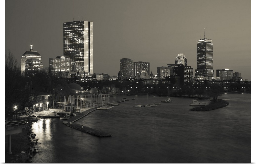 Landscape, oversized photograph of the Boston skyline at night, including the Boston Back Bay and the John Hancock Tower.