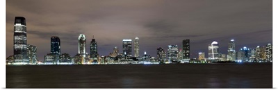 Buildings in a city lit up at night, Hudson River, Jersey City, Hudson County, New Jersey,