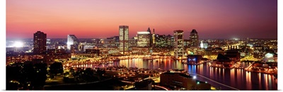 Buildings lit up at dusk, Baltimore, Maryland