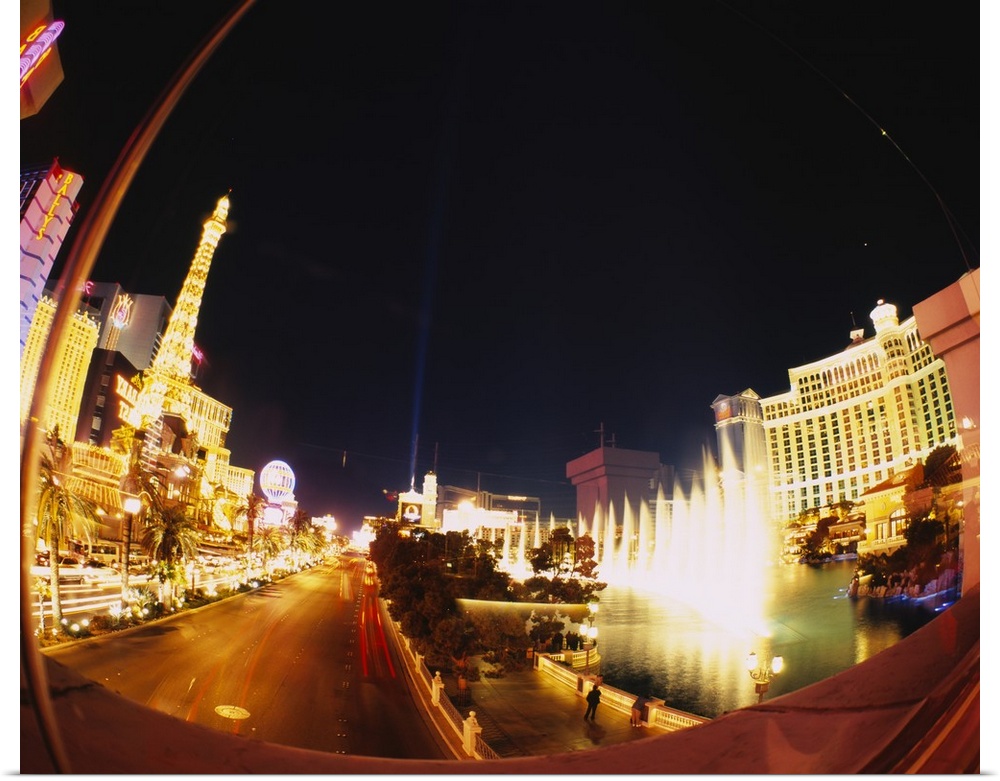 Big photograph of downtown Las Vegas, Nevada (NV) lit up at night.