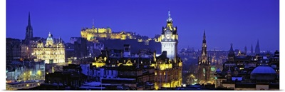 Buildings lit up at night with a castle in the background, Edinburgh Castle, Edinburgh, Scotland