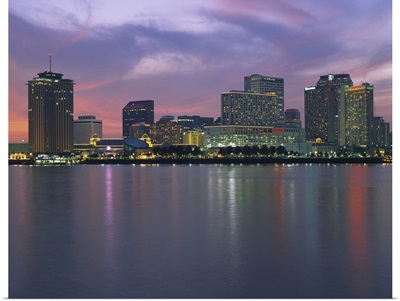 Buildings lit up at sunset, New Orleans, Louisiana