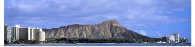 Buildings with mountain range in the background, Diamond Head, Honolulu, Oahu, Hawaii