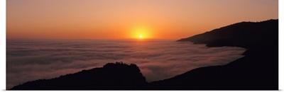 California, Big Sur, Pacific Ocean, Sunset with marine layer