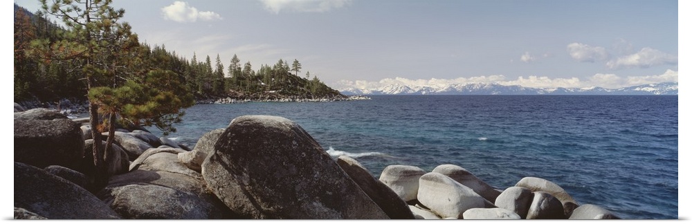 Panoramic photograph of the rocky shore of Lake Tahoe in California.