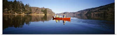 California, Stone Lagoon, View of a family canoeing on a lake