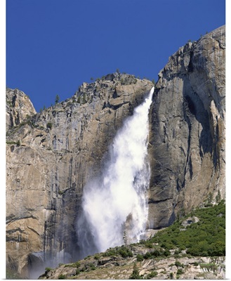 California, Yosemite National Park, Low angle view of a waterfall falling from the mountain