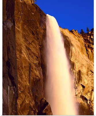 California, Yosemite National Park, Low angle view of the waterfall falling from the mountain