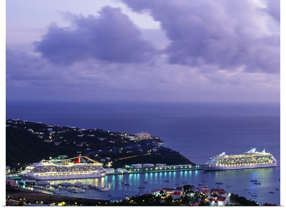 This decorative wall art is a landscape photograph of tourist cruise ships docking in a Caribbean harbor at twilight.