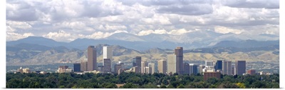 Clouds over skyline and mountains, Denver, Colorado