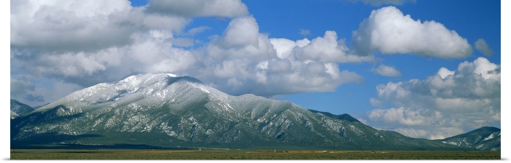 Clouds over snowcapped mountains, Taos, New Mexico