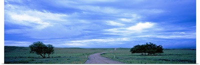 Country road passing through a landscape, Kansas