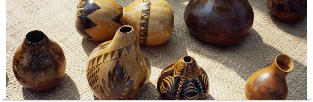 Decorated gourds named Ipu used as Hula rhythm instruments on a mat, Puuhonua o Honaunau National Historical Park, Honauna...