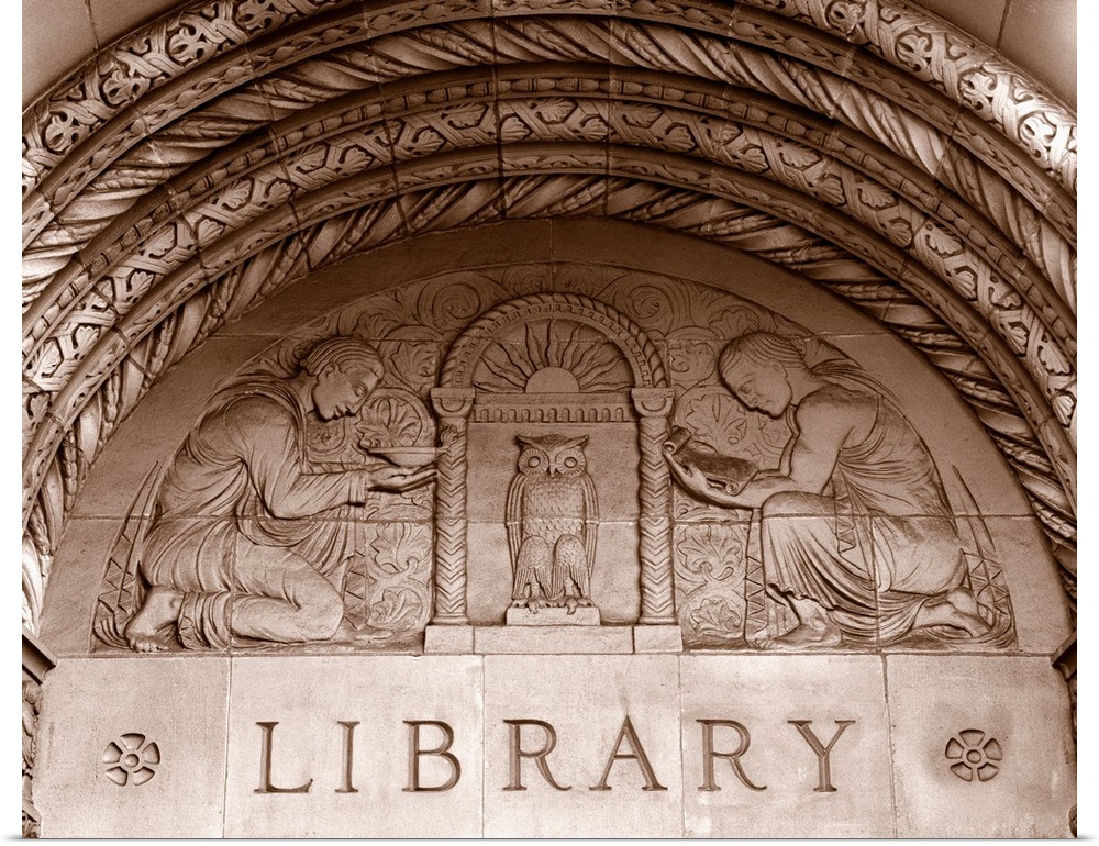 Detail of carvings on the wall of Powell Library, University of California, LA, CA